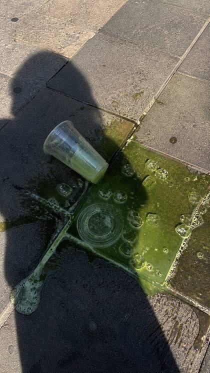 Preview of prompt 376 - Matcha Splash Street Phone Shot